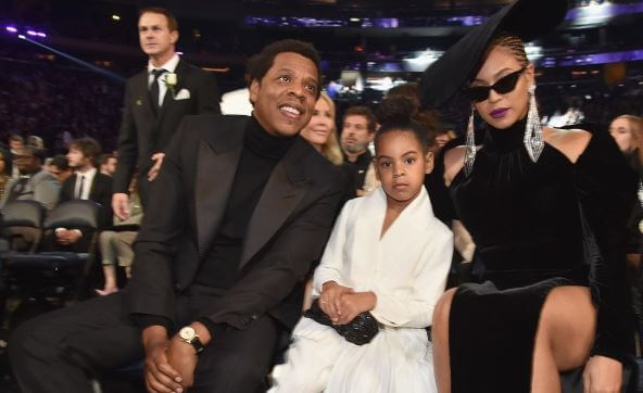 Blue Ivy Carter with her parents in Grammy